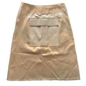 CÉLINE satin front pocket skirt in cream